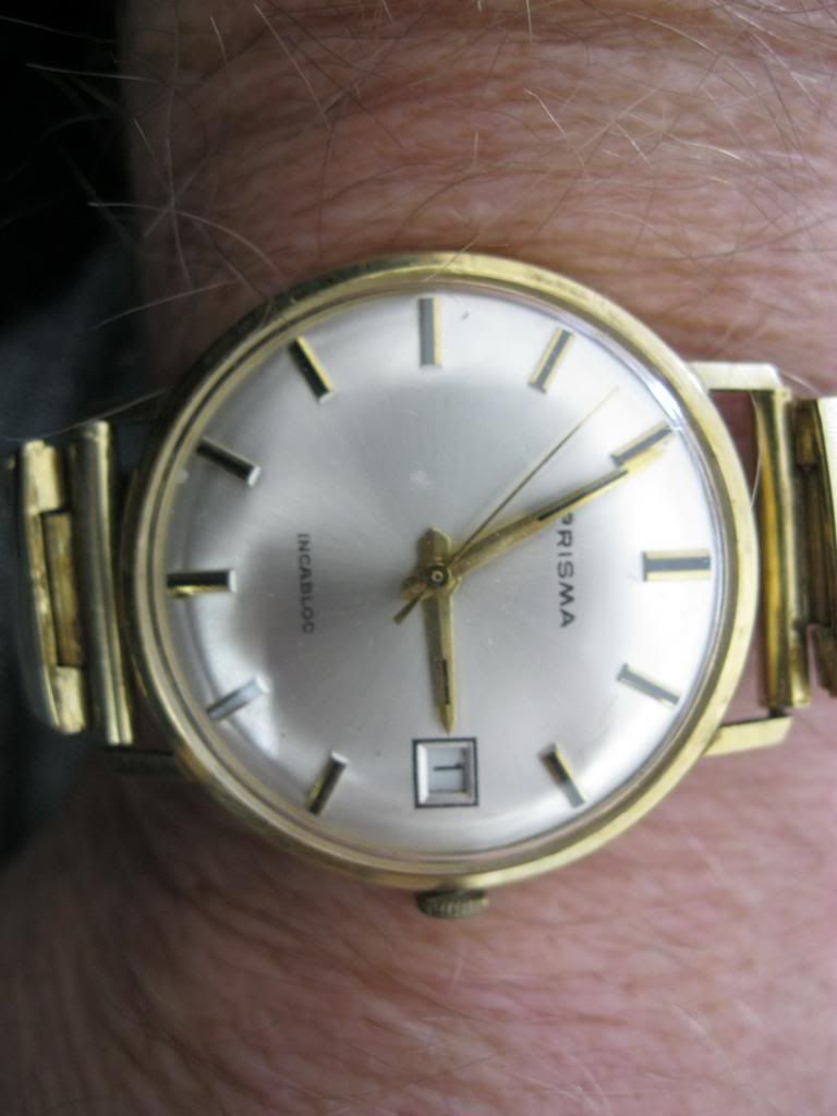 Prisma best sale gouden herenhorloge